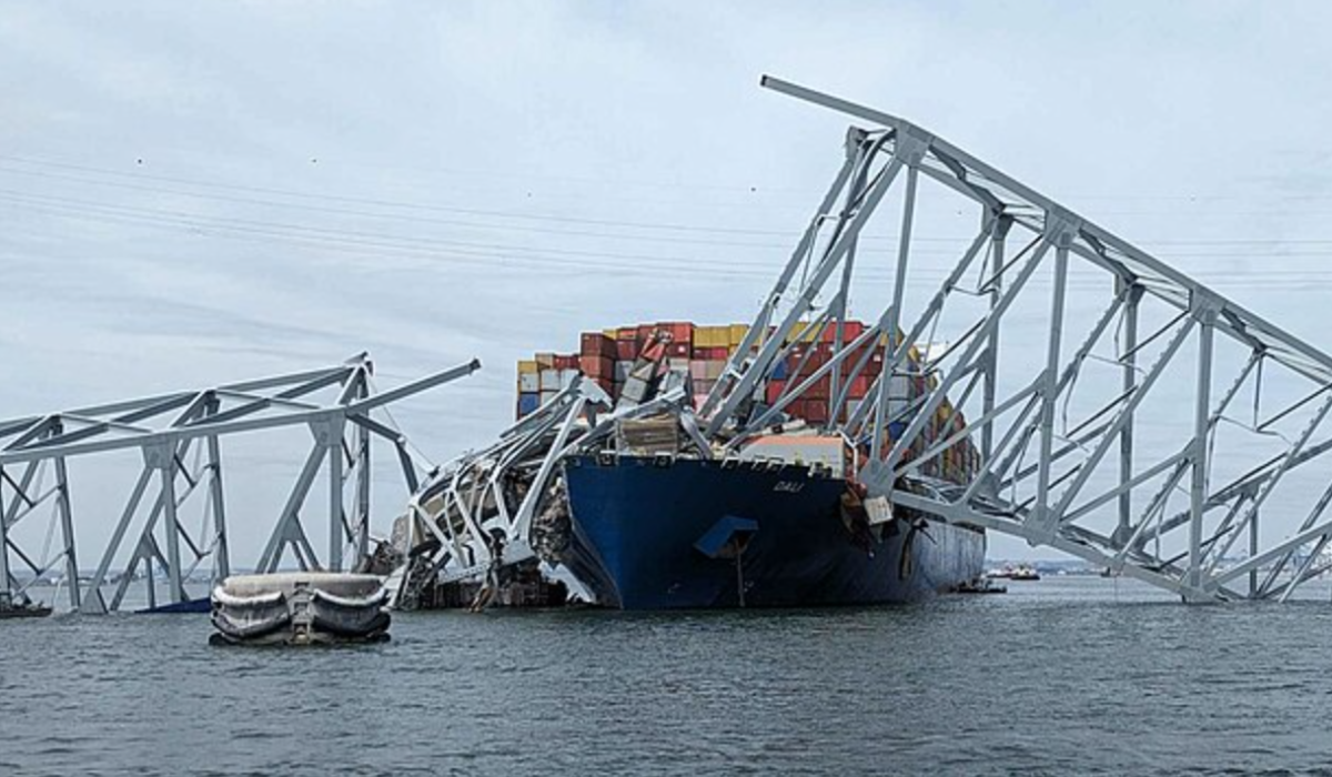 U.S. Army Corps of Engineers staff onboard Hydrographic Survey Vessel CATLETT observe the damage resulting from the collapse of the Francis Scott Key Bridge in Baltimore.